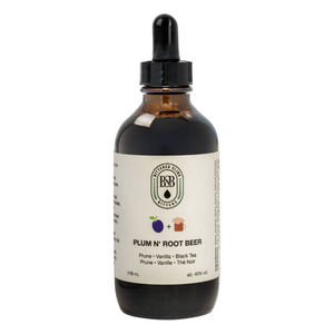 Bittered Sling - Plum & Rootbeer bitters bottle on white background