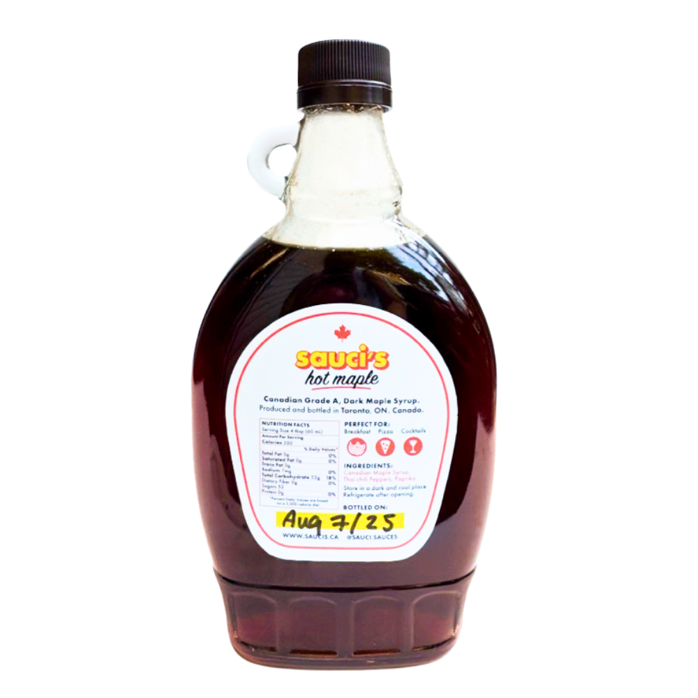 Bottle of Sauci's Hot Maple syrup on a white background
